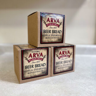 Photo of 3 boxes of garlic parmesan beer bread mix from Arva Flour Mill.